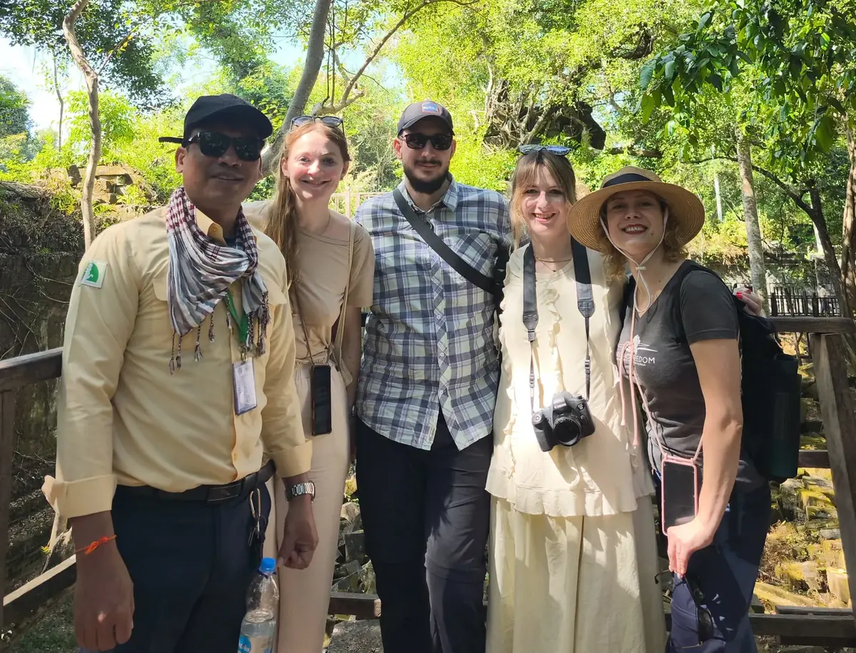 Sitha Roet, your Siem Reap tour guide, with guests at Angkor